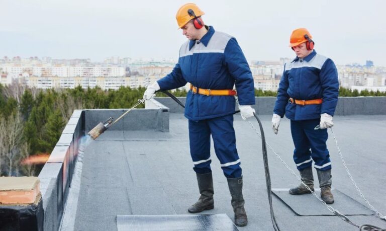 Why Regular Inspections by a Flat Roofing Specialist Matter