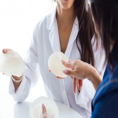 Does health insurance cover breast augmentation?